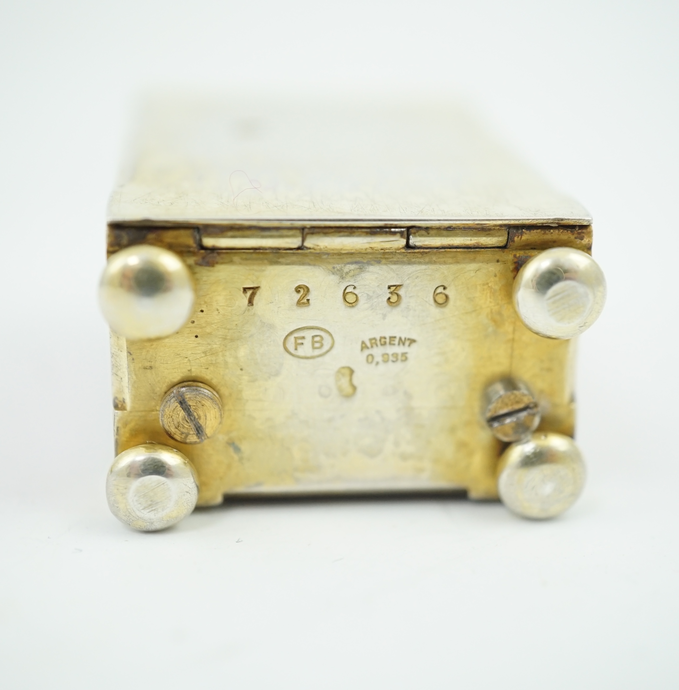 An early 20th century Swiss silver gilt and two colour enamel miniature carriage timepiece